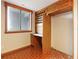A cozy office space features a built in desk and cabinets at 201 W Laurel St # 307, Tampa, FL 33602