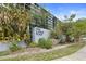 Exterior sign that says 'One Laurel Place' with greenery and landscaping at 201 W Laurel St # 307, Tampa, FL 33602