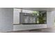 Modern water feature adds tranquility to the building's entrance and complements the surrounding landscaping at 201 W Laurel St # 307, Tampa, FL 33602