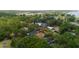An aerial view of a charming community with lush greenery and waterfront access at 209 Arlington E Ave, Oldsmar, FL 34677