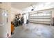 Spacious garage with ample storage space and an automatic door opener at 209 Arlington E Ave, Oldsmar, FL 34677