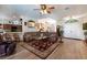 Bright and airy living room with an open floor plan and seamless access to the kitchen and dining area at 209 Arlington E Ave, Oldsmar, FL 34677
