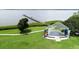 Scenic view of a park featuring a pier, waterfront access, and a stage for community events at 209 Arlington E Ave, Oldsmar, FL 34677