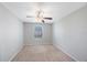 Bright bedroom with neutral paint, ceiling fan and carpet flooring at 2227 Golden Falcon Dr, Ruskin, FL 33570