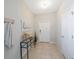 Entrance hall with neutral walls, tile flooring, and elegant decor, creating a welcoming atmosphere at 2227 Golden Falcon Dr, Ruskin, FL 33570