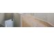 Spacious hallway with plush carpeting and a view leading to other areas of the home, including the laundry room at 2227 Golden Falcon Dr, Ruskin, FL 33570