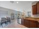 Open kitchen featuring granite countertops, stainless steel appliances, and seamless flow into the adjacent living area at 2227 Golden Falcon Dr, Ruskin, FL 33570