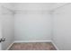 Empty walk-in closet with ample shelving provides great storage space at 2227 Golden Falcon Dr, Ruskin, FL 33570