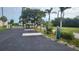 Wide driveway providing ample parking with power and water hookups ready for an RV at 3302 W Shell Point Rd, Ruskin, FL 33570