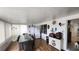 Bright and airy sunroom featuring tile floors and versatile layout with dining and entertainment areas at 3302 W Shell Point Rd, Ruskin, FL 33570