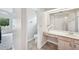 Bright bathroom featuring a vanity area and toilet room at 336 Northway Dr, Sun City Center, FL 33573