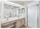 This spacious bathroom has an elegant vanity, and a walk-in shower at 336 Northway Dr, Sun City Center, FL 33573