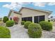 Charming home with manicured landscaping and vibrant flower accents at 336 Northway Dr, Sun City Center, FL 33573