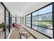 Sunroom features large windows offering lots of sunlight at 336 Northway Dr, Sun City Center, FL 33573