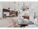 Gourmet kitchen boasts granite counters, dark wood cabinets, stainless appliances, and a breakfast bar at 336 Northway Dr, Sun City Center, FL 33573
