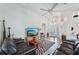 Bright living room featuring tile floors, ceiling fan, and large windows that flood the space with natural light at 336 Northway Dr, Sun City Center, FL 33573