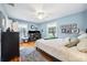 Comfortable bedroom setup with a working desk area, great light, and hardwood floors at 3408 W San Jose St, Tampa, FL 33629
