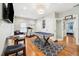 Entertainment room boasts a pool table, a treadmill, and a stylish area rug under a modern light fixture at 3408 W San Jose St, Tampa, FL 33629