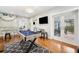 This game room comes complete with a ping pong table, pool table, and easy access to an outdoor patio at 3408 W San Jose St, Tampa, FL 33629