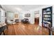 Cozy living room with hardwood floors, comfortable seating, and doorway view of the modern kitchen at 3408 W San Jose St, Tampa, FL 33629