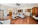 Inviting living room with hardwood floors, a comfortable couch, and plenty of natural light at 3408 W San Jose St, Tampa, FL 33629
