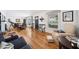 Bright living room featuring hardwood floors, comfortable furniture, and ample natural light at 3408 W San Jose St, Tampa, FL 33629