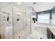 Modern main bathroom with a glass-enclosed shower, a separate tub, and luxurious finishes at 3408 W San Jose St, Tampa, FL 33629