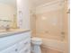 Cozy bathroom featuring a bathtub and shower combination and white vanity at 3777 Mission Ct, Largo, FL 33771