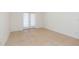 Comfortable bedroom with access to the backyard with natural light beaming in at 3777 Mission Ct, Largo, FL 33771