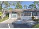 Charming single-story villa with a well-maintained front yard and covered entry at 3777 Mission Ct, Largo, FL 33771