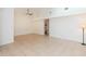 Open living area with tile flooring, ceiling fan, and a view to a closet at 3777 Mission Ct, Largo, FL 33771