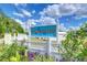 A beautiful Gem Estates entrance sign welcomes residents and guests to this lovely Florida community at 39407 Rockford Ave, Zephyrhills, FL 33542