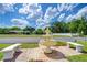 A welcoming water fountain offers a place to sit and relax and enjoy the Florida sunshine at 39407 Rockford Ave, Zephyrhills, FL 33542