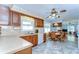 A classic kitchen with wooden cabinetry, ample counter space, and modern appliances at 39407 Rockford Ave, Zephyrhills, FL 33542