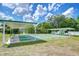 Community shuffleboard courts provide an active and social outlet for residents in a park-like setting at 39407 Rockford Ave, Zephyrhills, FL 33542