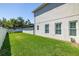Lush green backyard with a white fence and plenty of space for outdoor activities at 4010 W Leona St, Tampa, FL 33629