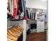 Organized walk-in closet featuring custom shelving, hanging rods, and a set of drawers at 4010 W Leona St, Tampa, FL 33629