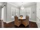 Dining room with natural light, a chandelier, and seating for four guests at 4010 W Leona St, Tampa, FL 33629