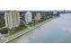 Scenic aerial shot of waterfront high-rise buildings with tranquil water and a clear road at 4141 Bayshore Blvd # 306, Tampa, FL 33611