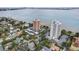An incredible aerial view showing the buildings and waterfront with city skyline views at 4141 Bayshore Blvd # 306, Tampa, FL 33611