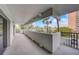 Spacious balcony with a view of lush greenery and city skyline at 4141 Bayshore Blvd # 306, Tampa, FL 33611