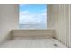 Balcony view overlooking the water with concrete flooring and balcony wall at 4141 Bayshore Blvd # 306, Tampa, FL 33611