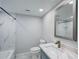 Bright bathroom featuring a sink vanity with a tub and shower at 4141 Bayshore Blvd # 306, Tampa, FL 33611