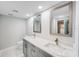 Bright bathroom features double sinks, stylish hardware, and a sleek quartz countertop at 4141 Bayshore Blvd # 306, Tampa, FL 33611