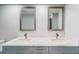 Bathroom featuring dual sinks, gray cabinetry, white countertop, and modern hardware at 4141 Bayshore Blvd # 306, Tampa, FL 33611