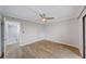 Bedroom featuring ceiling fan, neutral paint, and entrance to laundry room at 4141 Bayshore Blvd # 306, Tampa, FL 33611