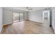 Bedroom featuring sliding glass doors to balcony and light colored wood floors at 4141 Bayshore Blvd # 306, Tampa, FL 33611
