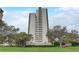 Beautiful exterior shot of a high-rise building with well-maintained landscaping, creating an inviting curb appeal at 4141 Bayshore Blvd # 306, Tampa, FL 33611
