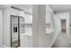 Open-concept kitchen featuring stainless steel appliances, a quartz countertop, and a modern design, perfect for entertaining guests at 4141 Bayshore Blvd # 306, Tampa, FL 33611