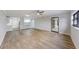 Bright living room with wood floors, neutral paint, and open layout at 4141 Bayshore Blvd # 306, Tampa, FL 33611